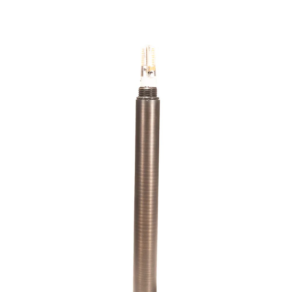 Bronze-colored lamp post on a white background