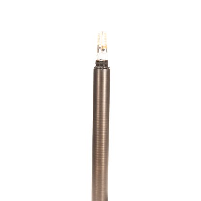 Bronze-colored lamp post on a white background