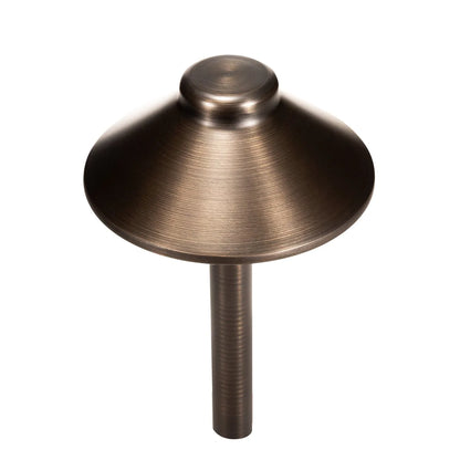 Bronze-colored metal knob on a white background