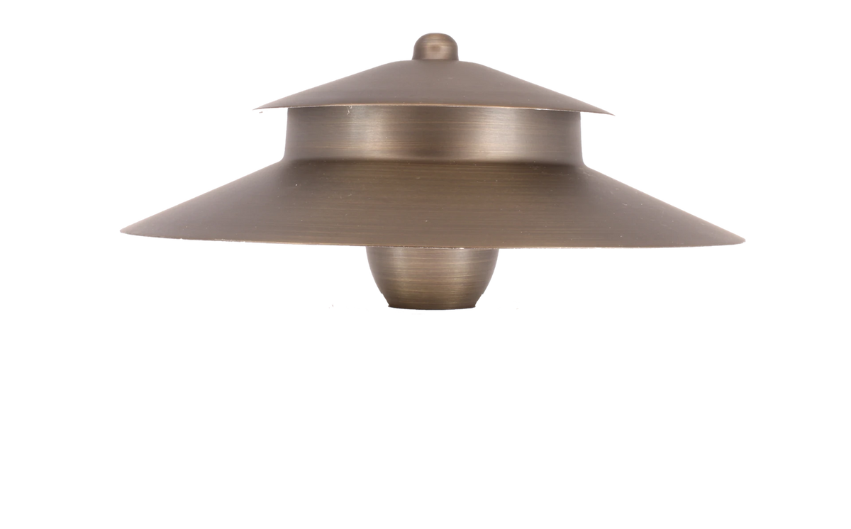 A brass two-tier path light replacement top with a glass lens.